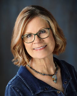 Headshot of Cheryl Brenegen.