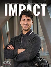 Cover of 2025 edition of Impact Magazine, featuring a male student posing on campus.