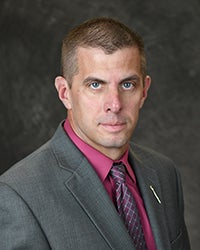 Headshot of Kevin Hennessey.