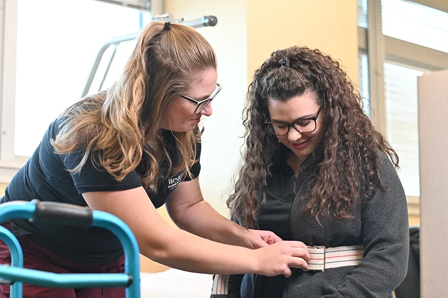 Student practicing occupational therapy on test patient