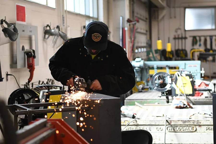 Image of man welding