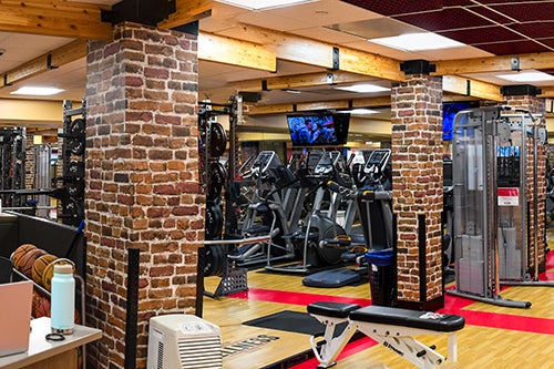 The Wellness Center features treadmills and other common workout equipment.