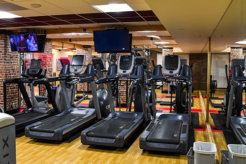 Many treadmills with nearby TVs are available to members.