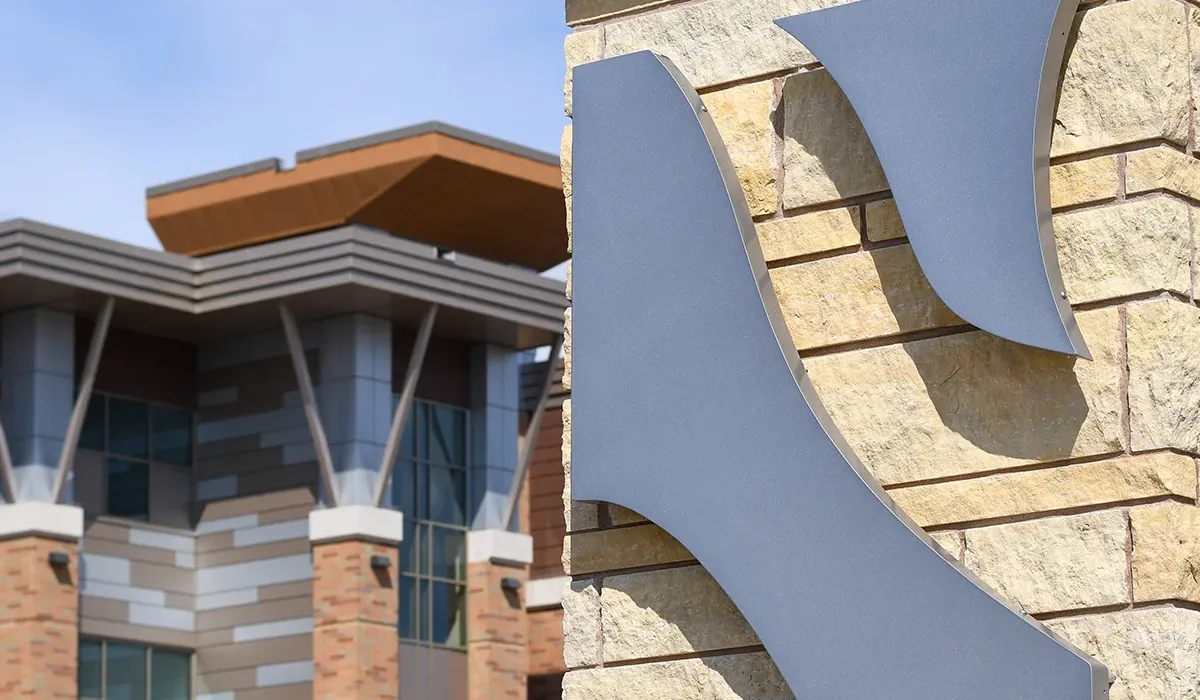 ITC building, with the edge of corner sign