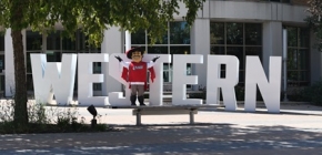 Cal the Cavalier with Western letters.